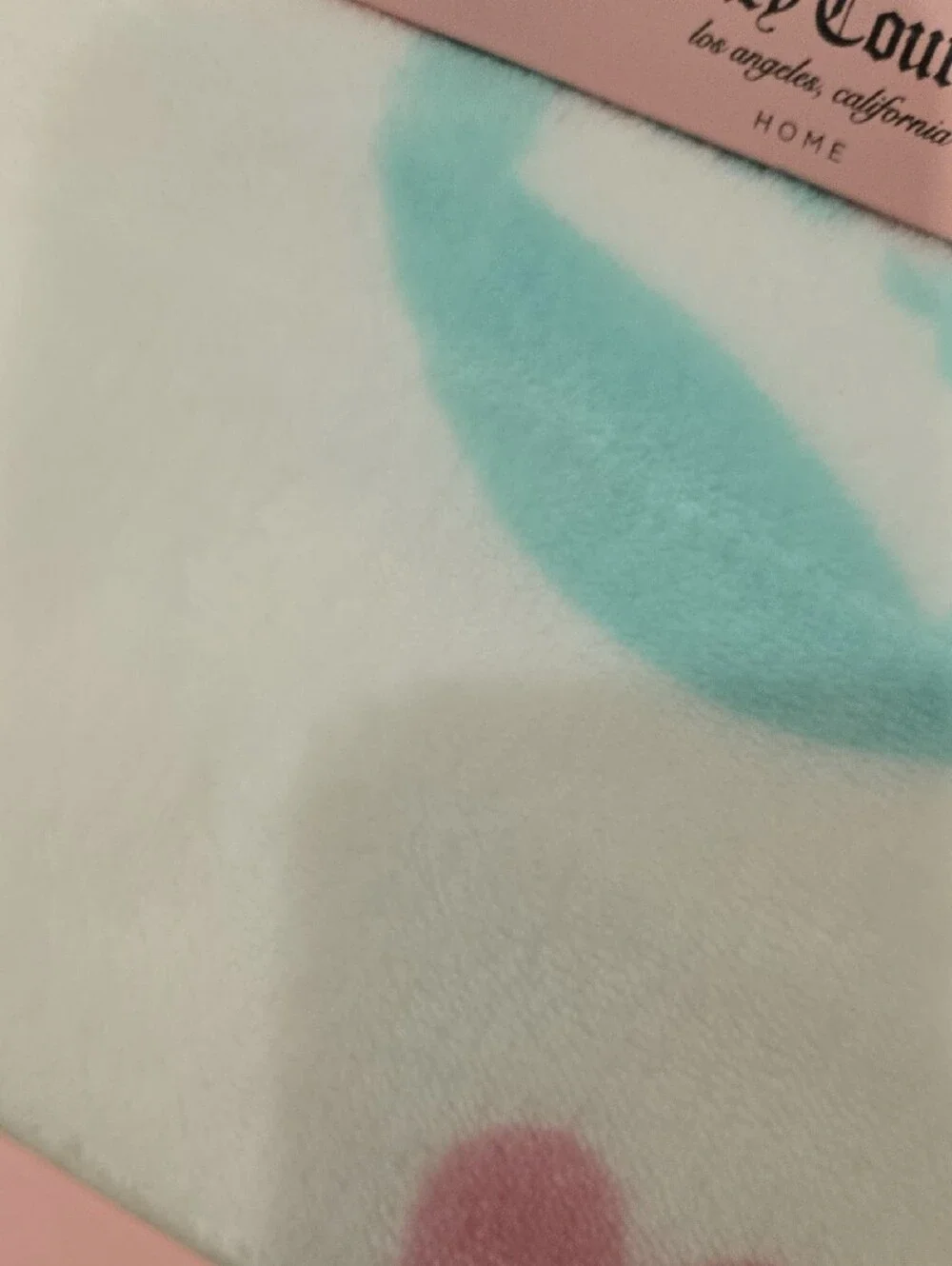 Juicy Couture Plush Printed Throw in White with Teal Pink and Lavender Accents